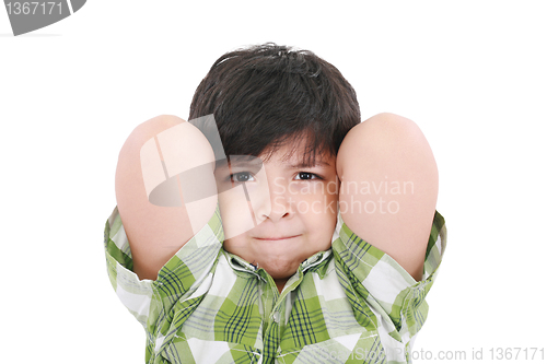 Image of Close up portrait of a young boy child smiling with arms up behi
