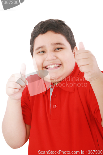 Image of Thumbs up shown by a happy young boy 