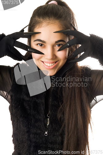 Image of Portrait of smiling young woman in gloves
