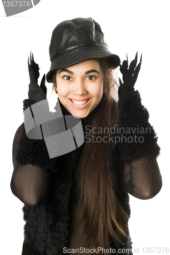 Image of Portrait of cheerful girl in gloves with claws. Isolated