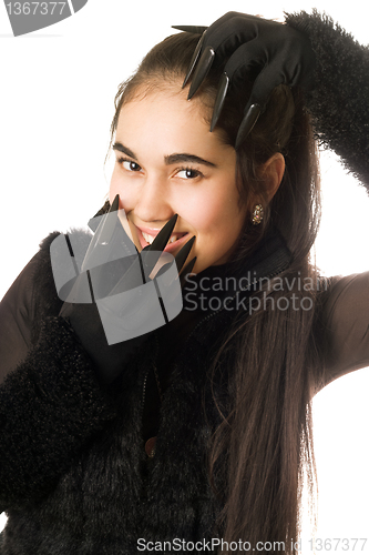 Image of Portrait of joyful young woman in gloves