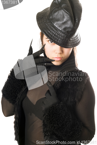 Image of Portrait of attractive girl in gloves with claws