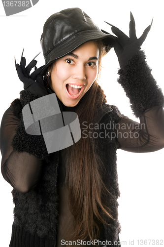 Image of Cheerful girl in gloves with claws. Isolated