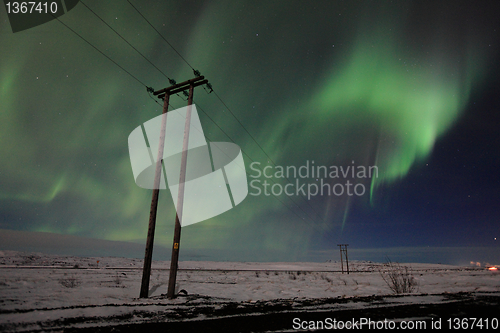 Image of Aurora over the electrical wires