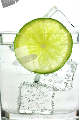 Image of iced drink with lemon , close up