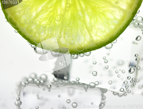 Image of iced drink with lemon , close up