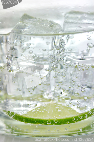 Image of iced drink with lemon , close up