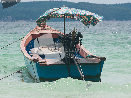 Image of Longtail boat moored at sea in Thailand