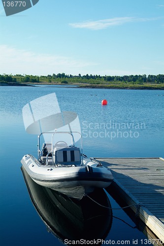 Image of Rigid inflatable boat at a pier