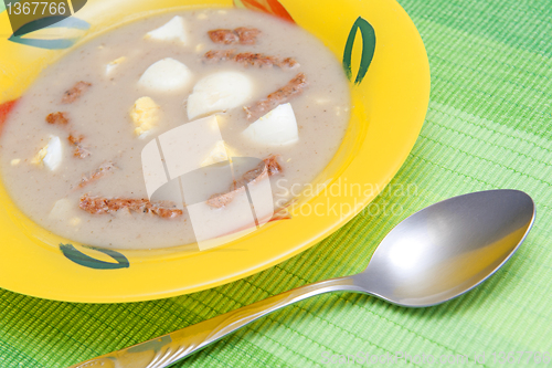 Image of Soup with sausages and eggs