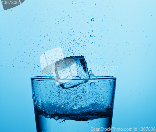 Image of  ice cube falling 