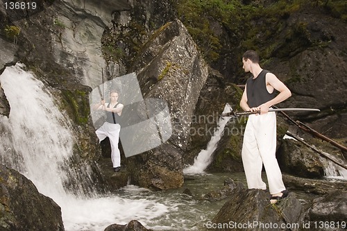 Image of Two man with katanas - fight