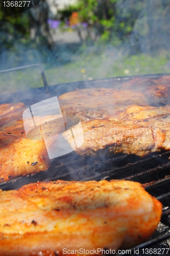 Image of meat on the barbecue