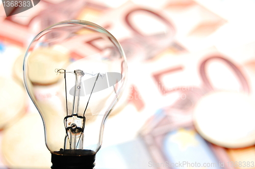 Image of bulb with business background