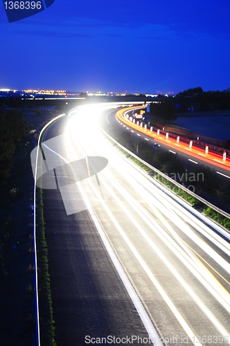 Image of night traffic on highway