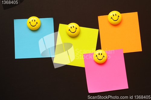 Image of smiley and paper with copyspace