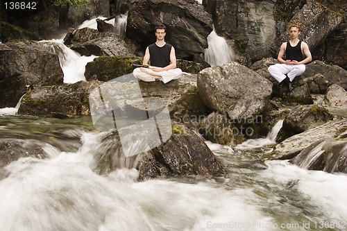 Image of Two man meditating after practice