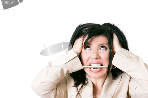 Image of Stressed woman looking up