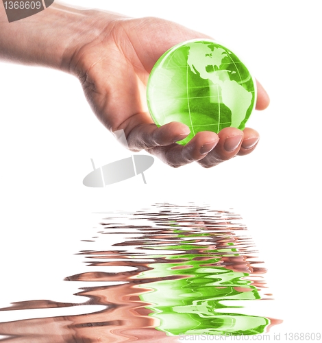 Image of hand and globe
