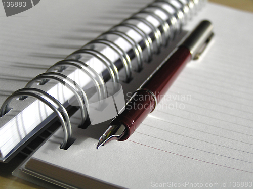 Image of Note book and pen