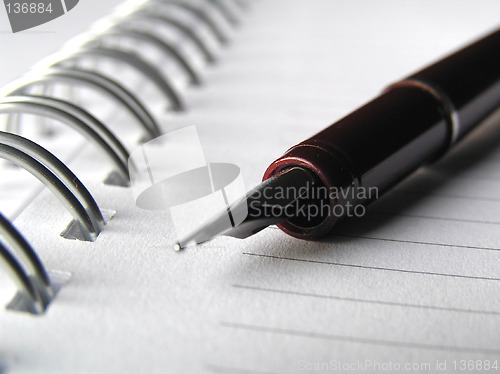 Image of Note book and pen