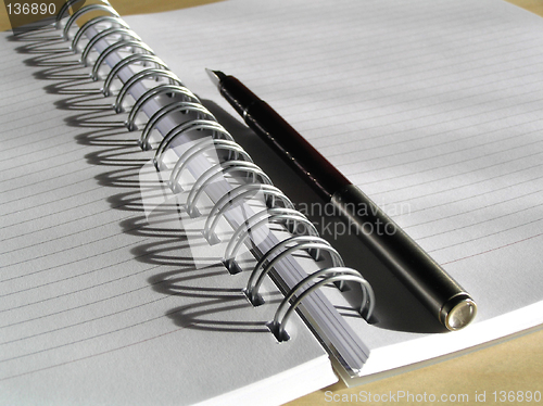 Image of Spiral diary and pencil