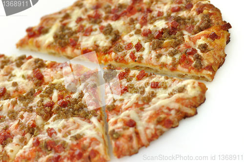 Image of  mini pizza  with sausage and pepperoni 