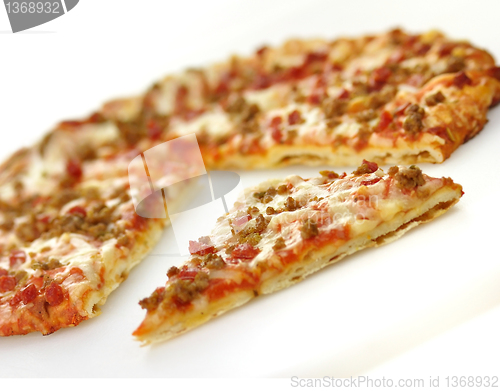 Image of mini pizza  with sausage and pepperoni