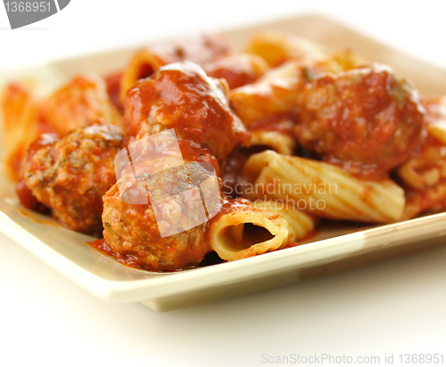 Image of Rigatoni with tomato sauce and meatballs.