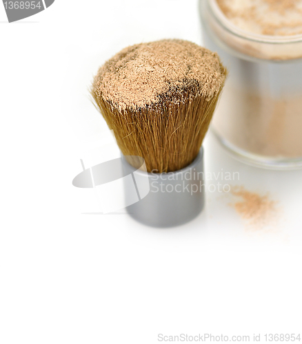 Image of Makeup powder and brush 