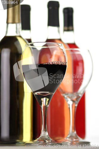 Image of assortment of wine bottles and glasses