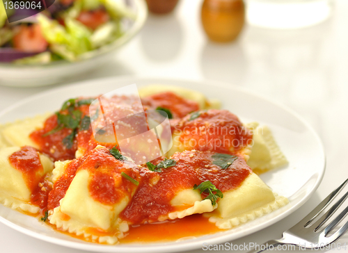 Image of Ravioli pasta with red tomato sauce