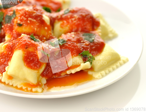 Image of Ravioli pasta with red tomato sauce 