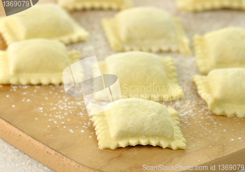 Image of Uncooked Ravioli on a cutting board