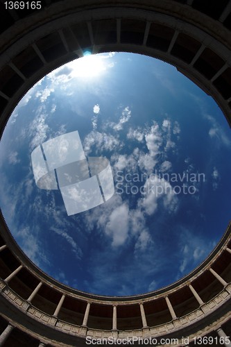 Image of Fisheye view of sky above Palacio de Carlos V in Granada