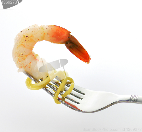 Image of shrimp on the fork with spaghetti