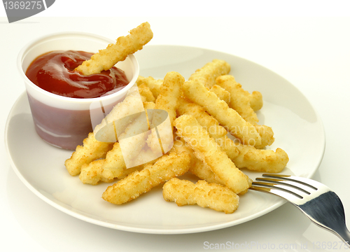 Image of fried potatoes in a white plate