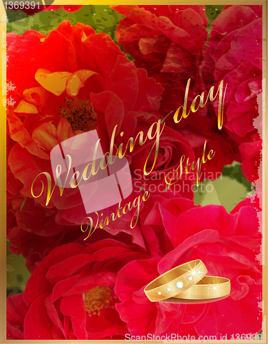 Image of Vintage wedding card with rings and red roses.