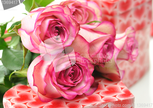 Image of pink roses and gift boxes
