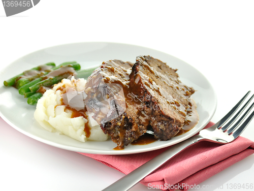 Image of meat loaf with mashed potatoes and green beans 