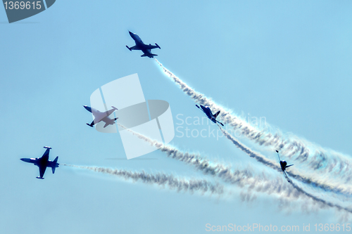 Image of airplanes on the blue sky 