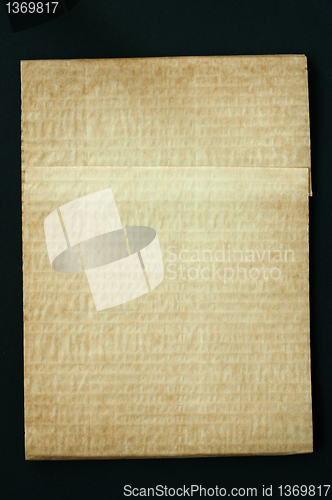 Image of Old worn paper folded