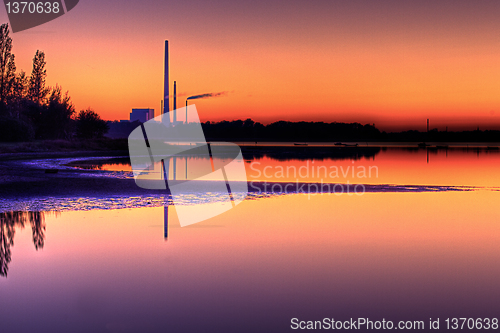 Image of Scenic view of Power Plant in sunset
