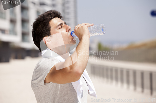 Image of Athlete drinking water