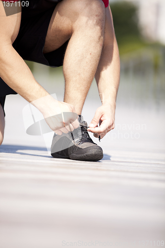 Image of Tightening the shoelace