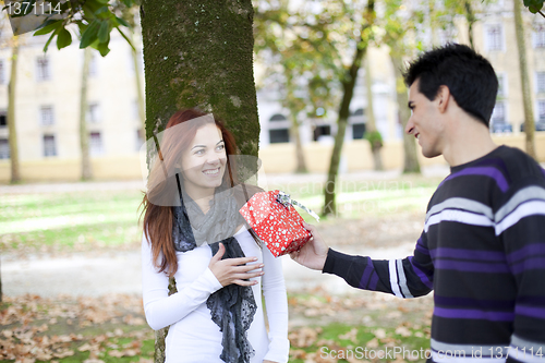 Image of Couple having fun at the park