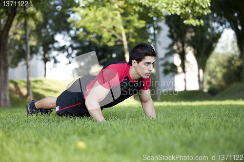 Image of Athlete man making pushups