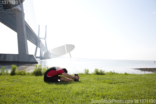 Image of Athlete warming and stretching