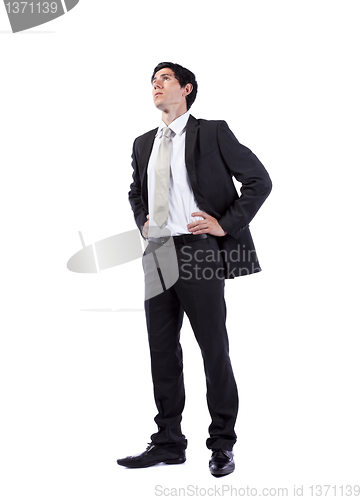 Image of Powerful businessman looking up