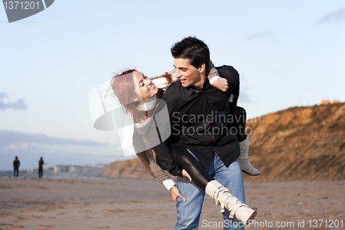 Image of Young couple having fun